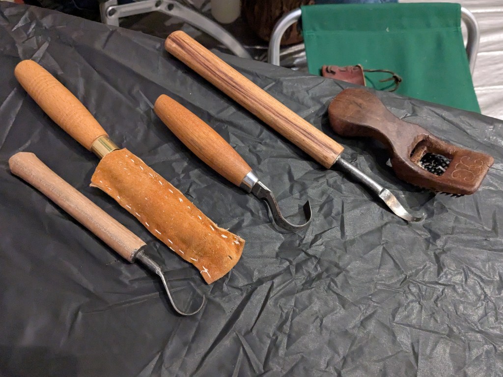 A set of tools sitting on a surface ready for use.